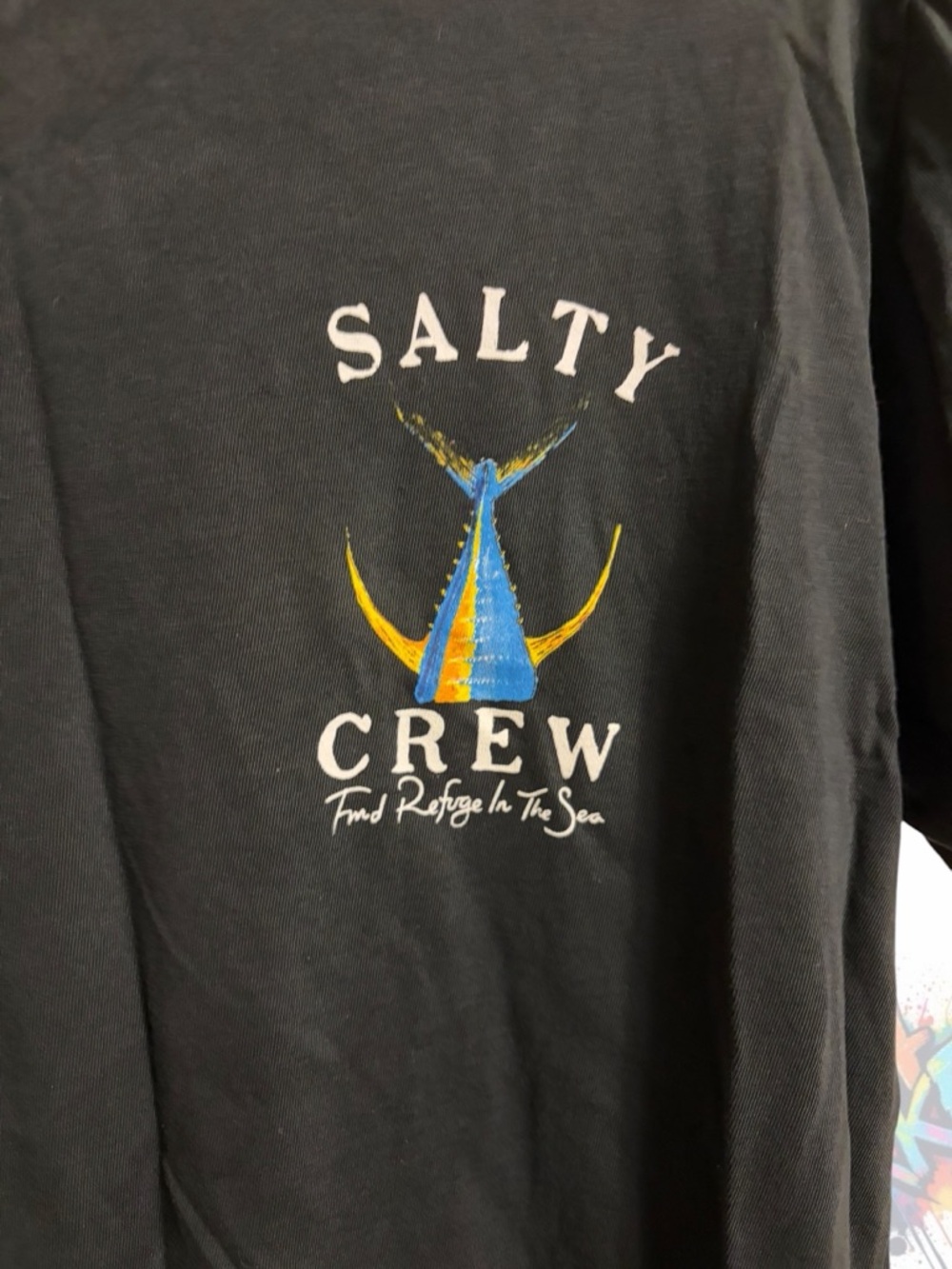 Salty Crew Black Tee with Blue & Yellow Marlin Tail Graphic